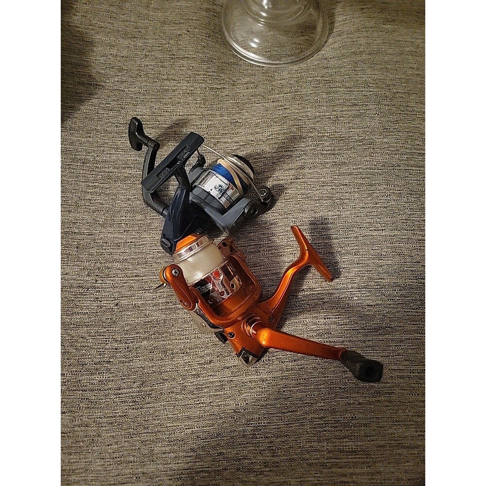 Lot Of 2 Fishing Reels NGage R2F Orange Zebco JWSP08 Black